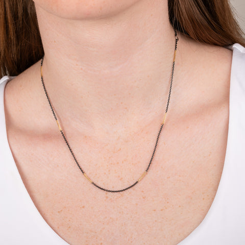 Oxidized silver and 18k gold necklace
