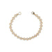 18k yellow gold chain bracelet with a row of akoya pearls and a gold lobster clasp.