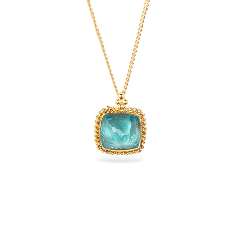 A gold chain necklace with a square pendant featuring an apatite stone set in an 18k bezel, shown against a plain white background.