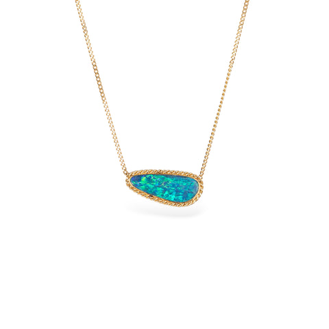 Handmade 18k gold necklace with an opal doublet pendant on a white background
