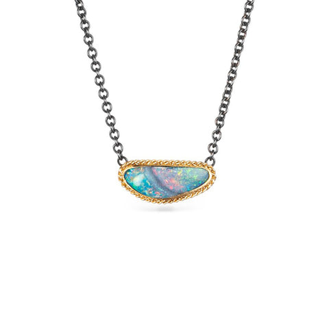 Australian opal gemstone necklace with a gold setting and oxidized silver chain