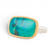 Gold and silver ring with gem silica gemstone on white background