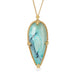 Blue opal petrified wood pendant necklace with gold setting on a white background