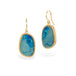 Gold earrings with blue australian opal gemsotnes on white background