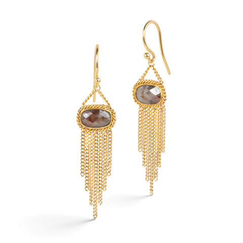 Gold earrings featuring brown diamonds and gold chain tassels, shown against a white background.