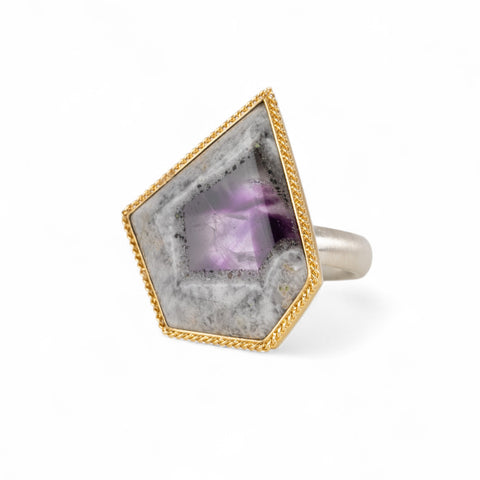 Handmade fine jewelry amethyst gemstone ring set in 18k gold with a sterling silver band