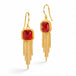 Gold earrings featuring fire opal gemstones and gold chain tassels, shown against a white background.