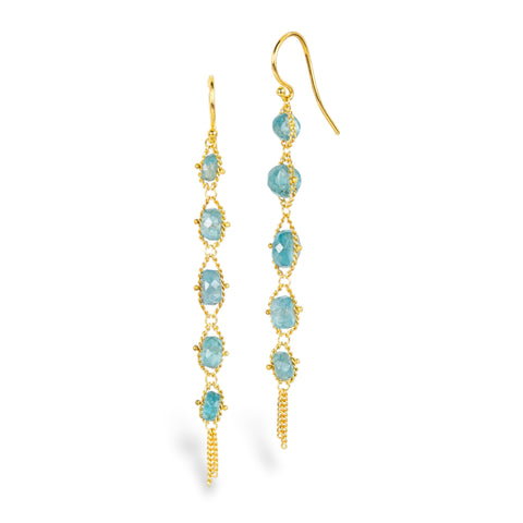 Gold earrings featuring a row of grandidierite stones, shown against a white background.