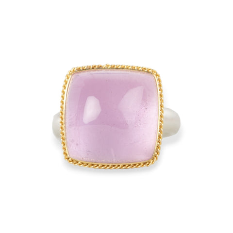 A square cushion-cut kunzite gemstone ring with a gold bezel and a sterling silver band, shown on a plain white background.