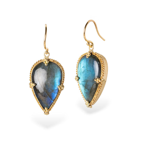Gold-framed Labradorite teardrop earrings on a white background