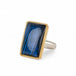 Handmade fine jewelry labradorite ring set in 18k gold with a sterling silver band