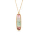 Handmade necklace with a watermelon tourmaline gemstone set in a gold bezel on a white background