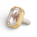 Side view of a ring with handmade gold frame and sterling silver band featuring a lodolite quartz stone on a white background