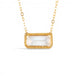 A gold necklace featuring a moonstone gem, against a white background.