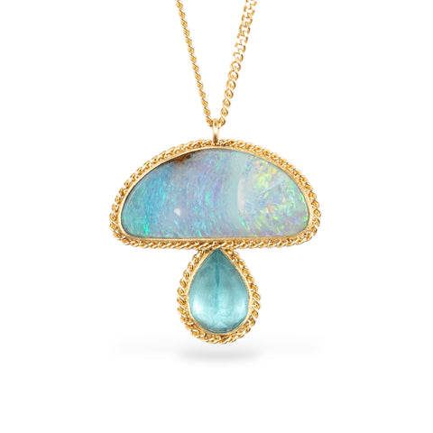 Opal and aquamarine pendant mushroom necklace with gold chain on a white background