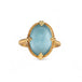 Handcrafted 18k gold ring with a blue aquamarine gemstone on a white background.