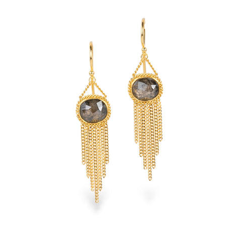 A pair of gold dangle earrings with oval diamond gemstones and cascading gold chain fringe, shown on a clean white background.