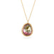 Handmade necklace featuring a watermelon tourmaline gemstone set in a 18k gold bezel and strung on a matching gold chain