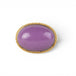 A gold and silver ring featuring a phosphosiderite stone, shown against a white background.