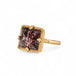 Gold ring with a square Super 7 gemstone on a white background.