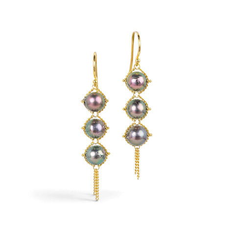 Gold trio earrings featuring three grey akoya pearls, shown on a white background.