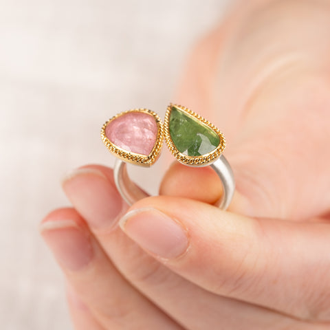 Tourmaline ring featuring green and pink tourmaline and silver band