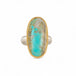Handmade fine jewelry turquoise ring with an 18k gold bezel and sterling silver band