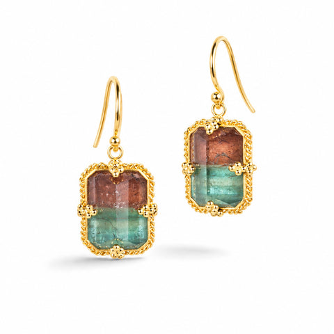 Gold earrings featuring watermelon tourmaline gemstones in duo-tones, shown against a white background.