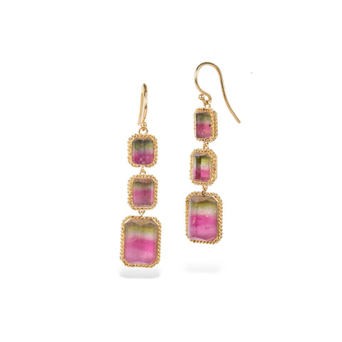 Handmade 18k gold earrings with watermelon tourmaline gemstones on a white background.