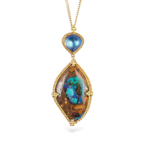 Gold Necklace featuring yowah nut opal and moonstone gemstones against a white background.