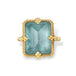 Gold ring with a rectangular aquamarine gemstone on a white background