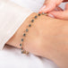 Bracelet with black diamonds on a person