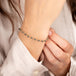 Bracelet with black diamonds on a person