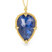 Gold necklace with a blue teardrop-shaped tanzanite gemstone pendant on a white background
