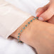 Bracelet with blue diamonds on a person