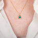 18k gold necklace featuring a boulder opal gemstone worn on a person