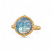 Gold ring with a carved moonstone on a white background
