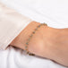 Delicate bracelet with champagne diamonds on a person