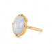 Gold ring with an opal stone on a white background