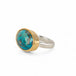 Handmade fine jewelry turquoise ring with an 18k gold bezel and sterling silver band