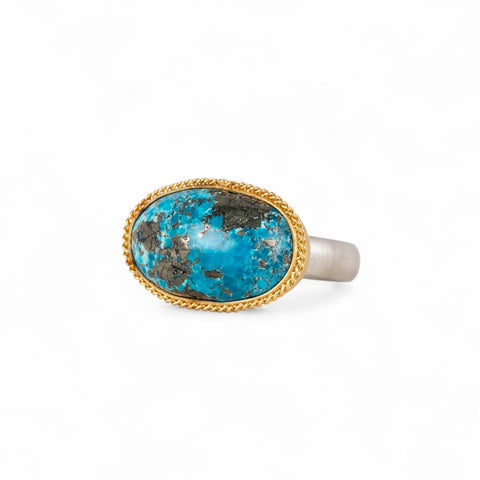 Turquoise fine jewelry ring with 18k gold bezel and sterling silver band