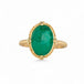 Gold ring with an emerald gemstone on a white background