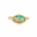 Gold ring with an Ethiopian opal stone on a white background