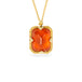 Gold necklace with a fire opal gemstone on a white background