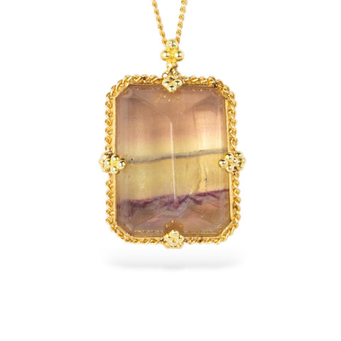 Gold necklace with a large, rectangular fluorite stone on a white background