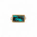 Turquoise ring with gold bezel and sterling silver band on white background
