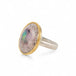 Handmade fine jewelry ring with a Mexican Opal stone, gold bezel and sterling silver band on a white background