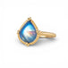 Gold ring with a blue teardrop-shaped moonstone on a white background