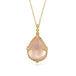 Gold necklace with a morganite teardrop pendant on a white background