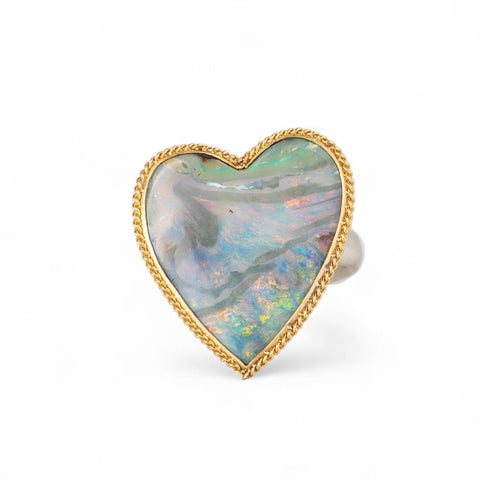 Handmade boulder opal heart ring with gold bezel and sterling silver band